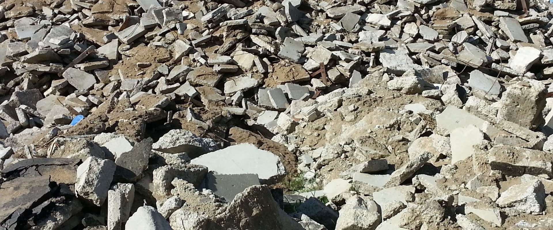 Can you put concrete pieces in dumpster?