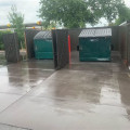 Concrete Pads for Dumpsters in Coastal Areas: Specs, Safety Standards, and What Property Owners Need to Know